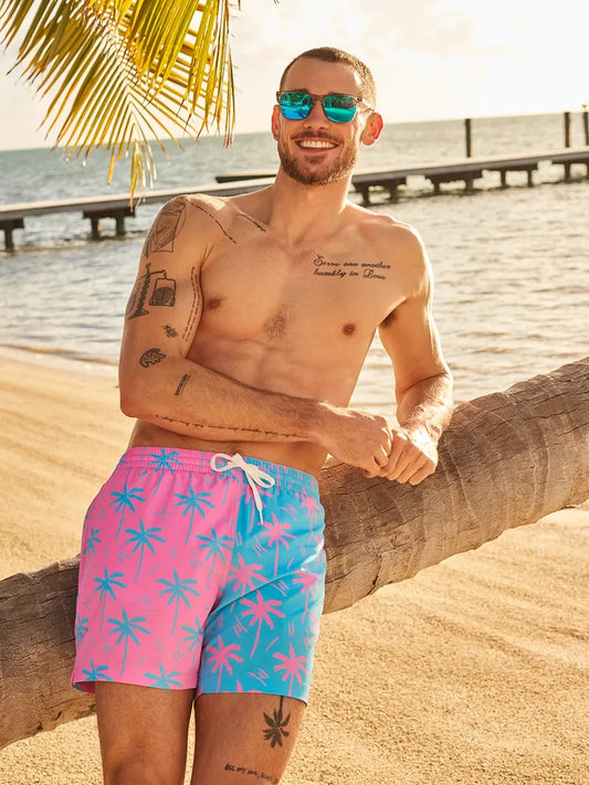 Chubbies The Prince of Prints Classic Swim Trunk, 5.5 Inseam, Blue/Pink Palms