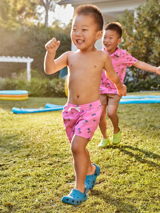 Chubbies The Dino Racers Toddler Classic Swim Trunk, Pink Dinosaur Palms